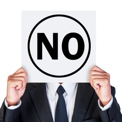 Say no concept shown by business man isolated on white background